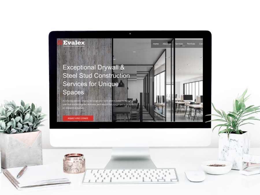 Evalex Contracting website shown on a desktop monitor